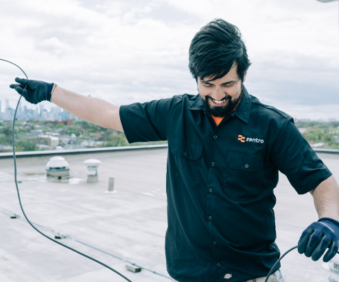 Zentro Technician working on Internet for Apartments - Internet for Condos