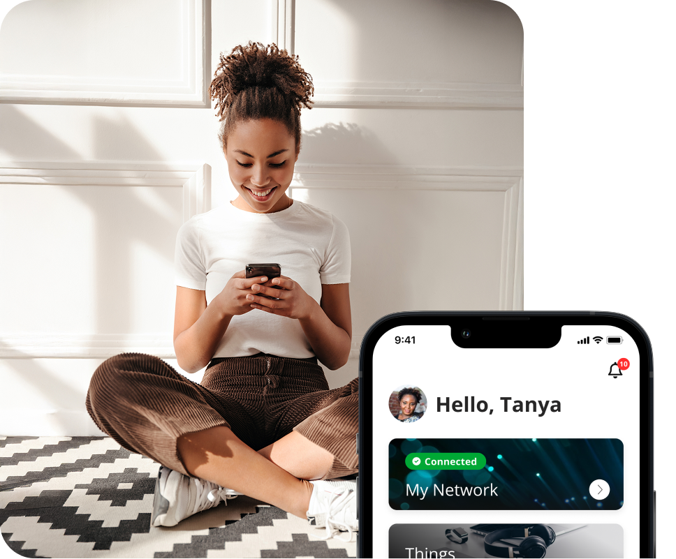 Person waving during video call on laptop at home kitchen workspace with modern internet connectivity